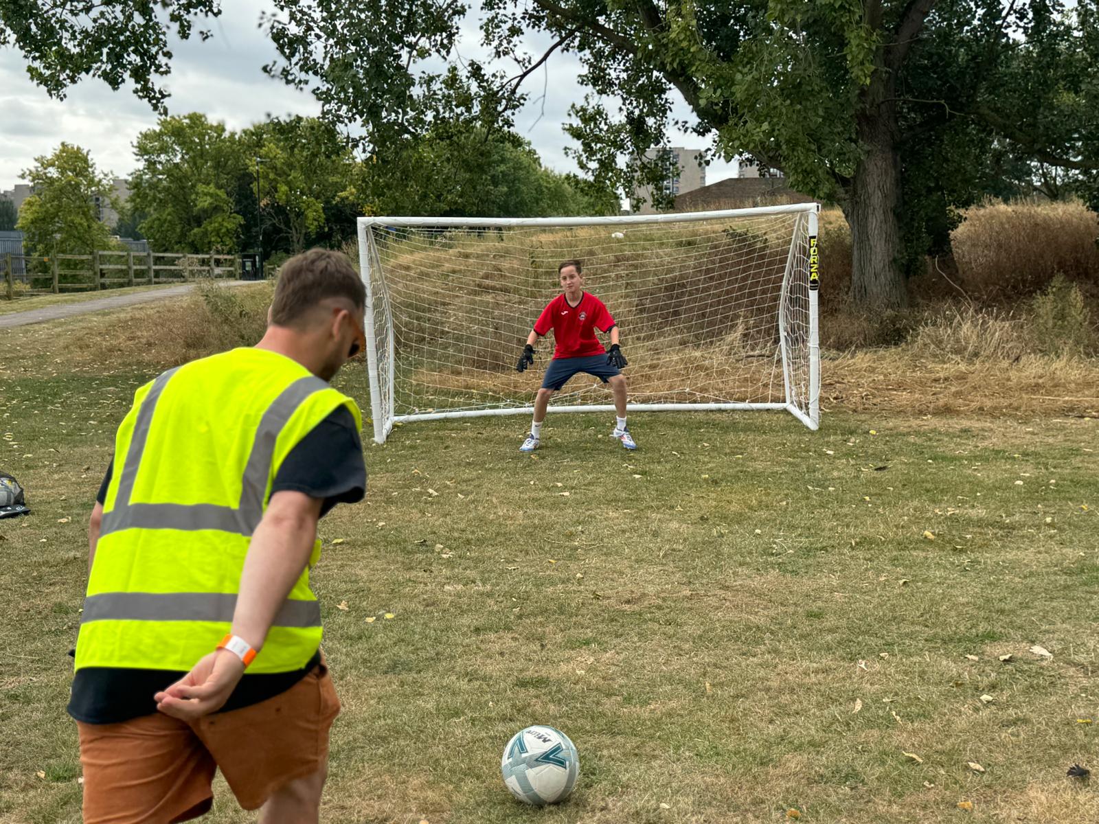 One of the Thamesmead Festival crew takes a spot kick