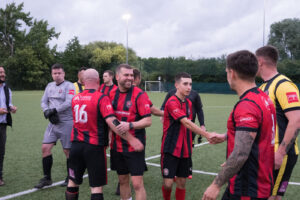 Statom charity match handshake