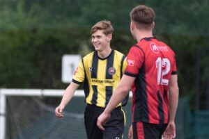 Statom charity match two players