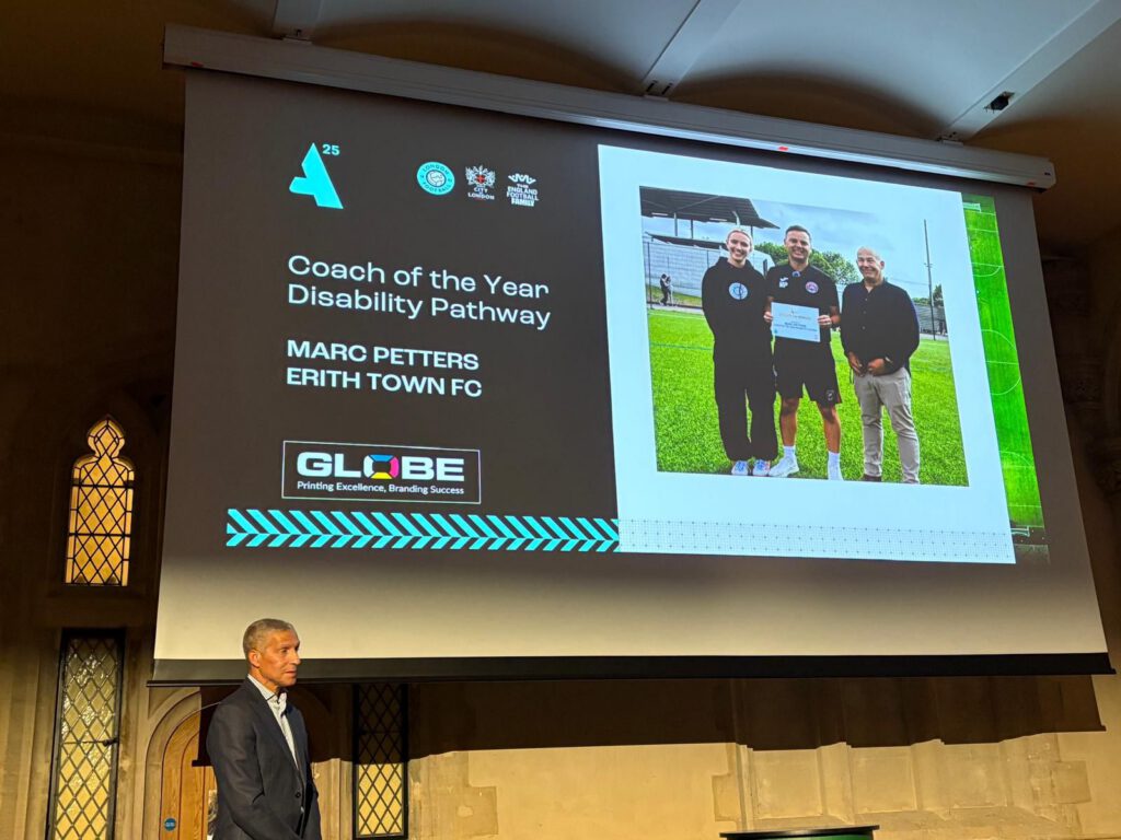 Marc Petters collects his Award